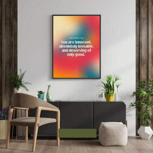 Colorful framed quote on a wall with a beautiful reminder thatt you are lovable and worthy and deserving of good..