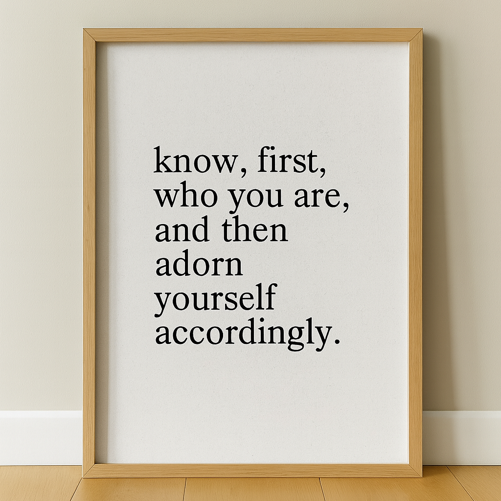 Framed print with Stoic motivational quote on a plain wall: Know, first, who you are, and then adorn yourself accordingly