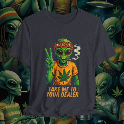 T-shirt with alien design and text 'Take me to your dealer' on a dark background with alien graphics.