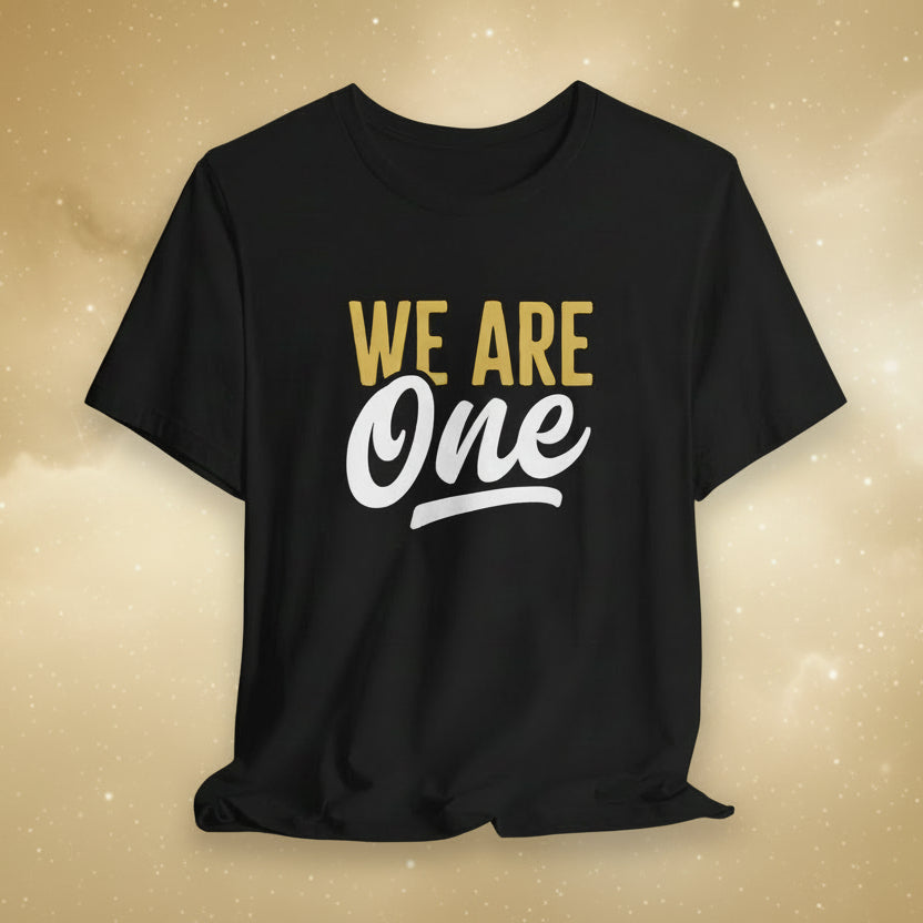 Black t-shirt with 'WE ARE One' text on a patterned background