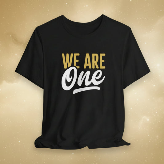 Black t-shirt with 'WE ARE One' text on a patterned background